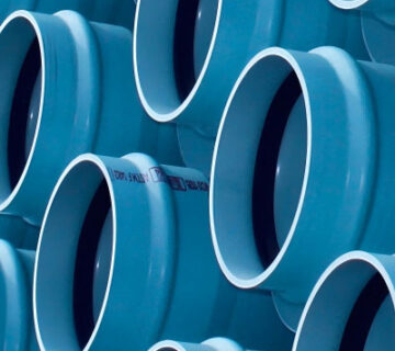 Blue rigid plastic PVC tubing for construction applications