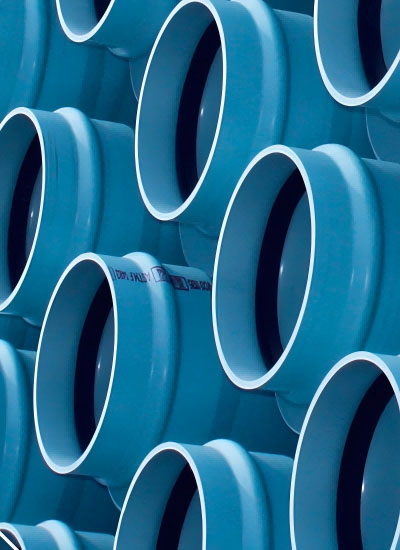 Blue rigid plastic PVC tubing for construction applications