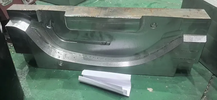 Plastic handle produced using rapid tooling for short-run injection molding