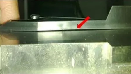 Plastic warpage defect in injection-moulded parts showing bending and deformation