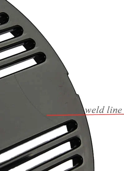 Close up of weld line defect on plastic housing surface