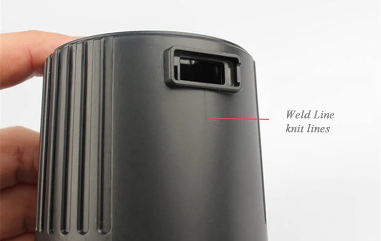 Weld line or knit line defect visible on the surface of a plastic molded enclosure
